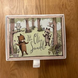 Two Ollie world swaddles